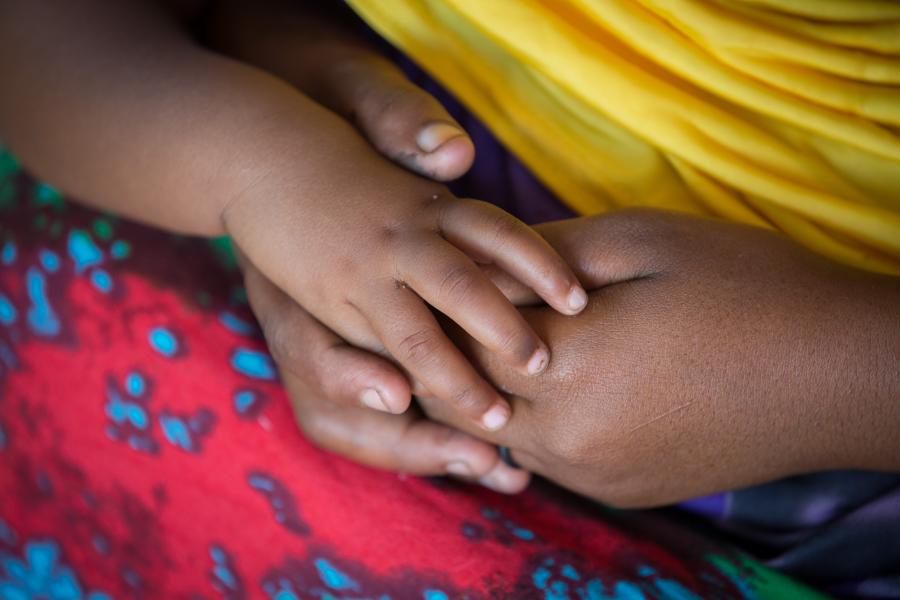 A young child's hands